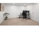 Finished basement features a work station area and neutral colored carpet at 4793 S Swadley St, Morrison, CO 80465