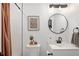 Clean and modern bathroom with new fixtures and a tiled shower at 4793 S Swadley St, Morrison, CO 80465