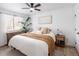 Bright bedroom with natural light, wood floors, and modern decor at 4793 S Swadley St, Morrison, CO 80465