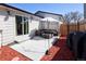 Outdoor patio area with comfortable seating and lighting and a grill, perfect for entertaining at 4793 S Swadley St, Morrison, CO 80465