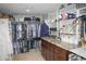 Organized walk-in closet offering custom shelving, drawers, hanging rods, and granite countertops at 226 Hidden Valley Ln, Castle Rock, CO 80108