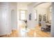 Hallway with hardwood floors, and decoratively painted neutral-colored walls at 226 Hidden Valley Ln, Castle Rock, CO 80108
