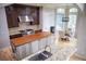 Gourmet kitchen with custom island, stainless appliances, and breakfast nook at 226 Hidden Valley Ln, Castle Rock, CO 80108