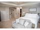 Large primary bedroom features a king bed, sitting area, and dual closets at 226 Hidden Valley Ln, Castle Rock, CO 80108