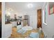 Cozy kitchen with modern appliances, a breakfast table, and ample natural light at 9240 W 49Th Ave # 317, Wheat Ridge, CO 80033