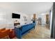 Open-concept living area flows into a modern kitchen, creating a welcoming space for entertaining and relaxation at 9240 W 49Th Ave # 317, Wheat Ridge, CO 80033