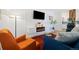 Cozy living room with modern fixtures and decor, with hardwood floors, creating a warm ambiance at 9240 W 49Th Ave # 317, Wheat Ridge, CO 80033