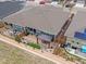 An aerial view of a home showcasing its spacious outdoor patio and landscaped backyard with a gazebo and retaining wall at 4538 Hidden Gulch Rd, Castle Rock, CO 80104