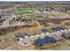 An aerial view of a property highlighting its location in a neighborhood near a school and open green spaces at 4538 Hidden Gulch Rd, Castle Rock, CO 80104
