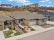 Inviting home featuring a covered porch, stone accents, and a beautifully landscaped front yard at 4538 Hidden Gulch Rd, Castle Rock, CO 80104