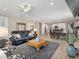 Open-concept living space with modern furnishings, adjoining dining and kitchen areas at 4538 Hidden Gulch Rd, Castle Rock, CO 80104