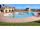 Community pool with splash pad and seating area, perfect for Gathering fun and relaxation at 4538 Hidden Gulch Rd, Castle Rock, CO 80104