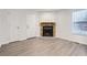 Living room with fireplace and light flooring at 932 S Dearborn Way # 8, Aurora, CO 80012