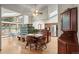 Spacious kitchen and dining area with stainless steel appliances and tile fireplace at 5274 Idylwild Trl, Boulder, CO 80301