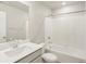Clean bathroom with a tub and shower combination, complete with a vanity and modern fixtures at 8879 Sedalia St, Commerce City, CO 80022