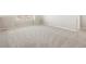Spacious bedroom with plush carpeting and a window offering ample natural light at 8879 Sedalia St, Commerce City, CO 80022