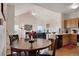 Cozy dining area adjacent to kitchen and living space with lots of natural light at 2428 W 82Nd Pl # 3A, Westminster, CO 80031