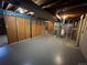 Exposed beams and plumbing in unfinished basement, ready for customization at 12831 E Mexico Ave, Aurora, CO 80012