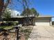 Well-kept single Gathering home with a two-car garage and a cozy, inviting front yard at 12831 E Mexico Ave, Aurora, CO 80012