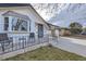 Charming home exterior with a well-maintained front porch and landscaped yard at 8610 Jolene Dr, Denver, CO 80229