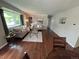 Bright living room with hardwood floors, a large window, and comfortable seating at 8610 Jolene Dr, Denver, CO 80229