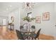 Stylish dining area with decorative lighting, hardwood floors, and elegant wall art at 1713 Grove St, Denver, CO 80204