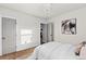 Bright bedroom featuring a neutral color palette, stylish artwork, and modern fixtures for a welcoming space at 3250 N Clayton St, Denver, CO 80205