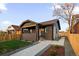 Charming home with a covered front porch and walkway at 3250 N Clayton St, Denver, CO 80205