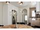 Bright kitchen features white cabinets, stainless steel appliances, and wood table at 3250 N Clayton St, Denver, CO 80205