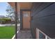 Inviting front door with brick landing on a modern-style home at 6641 Ash St, Commerce City, CO 80022