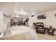Large basement with carpet and lighting; ready for customization into a rec room or home gym at 13558 E Center Ave, Aurora, CO 80012