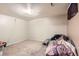 Empty bedroom with carpet and neutral paint; a blank canvas for personalization at 13558 E Center Ave, Aurora, CO 80012