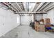 Spacious unfinished basement with exposed ceilings, providing potential for a customizable living space at 15920 Hayloft Ln, Parker, CO 80134