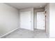 An empty bedroom featuring neutral walls and plush carpet at 15920 Hayloft Ln, Parker, CO 80134