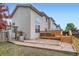 Backyard featuring a wooden deck and stone patio perfect for outdoor entertaining at 401 W 114Th Pl, Northglenn, CO 80234
