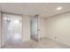 Finished basement area with fresh white paint, clean carpet, closet, and ample space for various uses at 401 W 114Th Pl, Northglenn, CO 80234