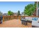 Outdoor deck with comfortable seating and fire table at 401 W 114Th Pl, Northglenn, CO 80234