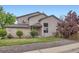 Beautiful two-story home featuring well-manicured lawn, gravel accents, and mature trees at 401 W 114Th Pl, Northglenn, CO 80234