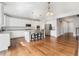 Modern kitchen featuring white cabinets and granite countertops at 5946 S Kellerman Ct, Aurora, CO 80016