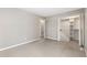 A carpeted bedroom featuring a bi-fold door closet and a neutral color palette at 1607 Cottonwood Dr # 14, Louisville, CO 80027