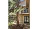 Condo exterior with a tree, sliding glass door, and a patio at 1607 Cottonwood Dr # 14, Louisville, CO 80027