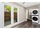 Versatile living space includes in-unit laundry, outdoor access, and storage solutions, all with hardwood floors at 1607 Cottonwood Dr # 14, Louisville, CO 80027