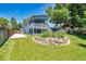 Spacious backyard with a raised patio and a large deck at 8160 W 81St Pl, Arvada, CO 80005
