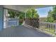 View of the covered deck, with a privacy screen at 8160 W 81St Pl, Arvada, CO 80005