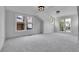 Bright bedroom with large windows and carpet flooring at 1343 Milwaukee St, Denver, CO 80206