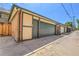 Exterior view of a two-car garage with neutral paint at 1343 Milwaukee St, Denver, CO 80206