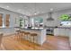 Bright, modern kitchen with stainless steel appliances and island seating at 1343 Milwaukee St, Denver, CO 80206