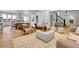 Open concept living area with seamless flow to kitchen and dining at 1343 Milwaukee St, Denver, CO 80206
