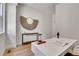 Bright office space with hardwood floors and a white desk; perfect space for work from home at 1343 Milwaukee St, Denver, CO 80206