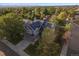 Two-story house with solar panels and a mountain view at 7291 Palisade Dr, Highlands Ranch, CO 80130